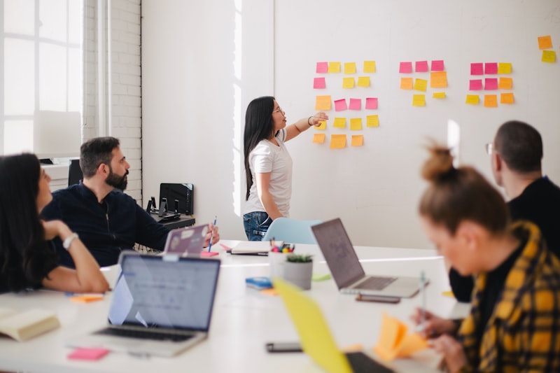 Creative workshop team meeting with sticky notes